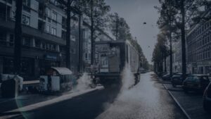 semi-truck driving on a surface street