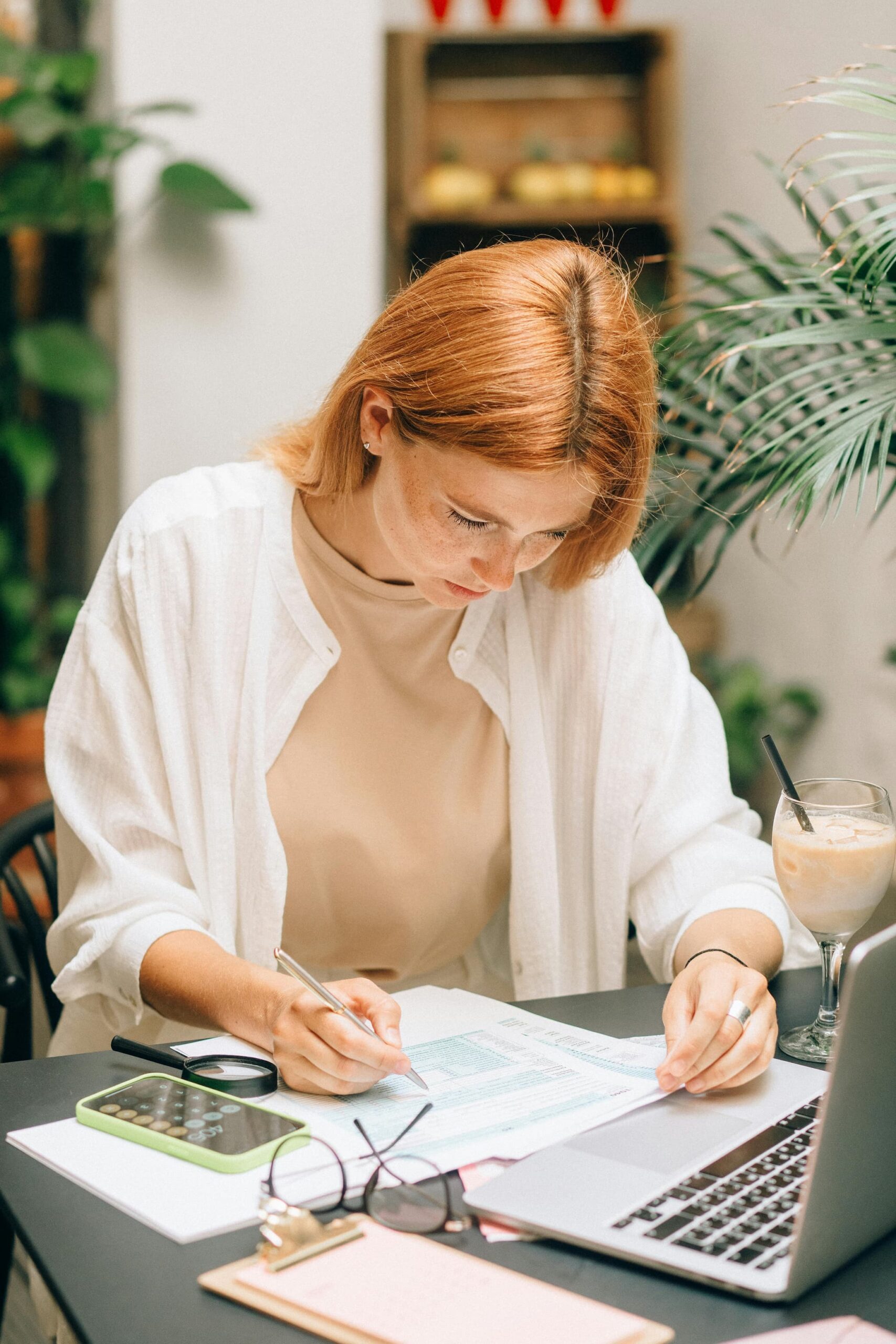 woman working on legal paperwork for her car accident claim