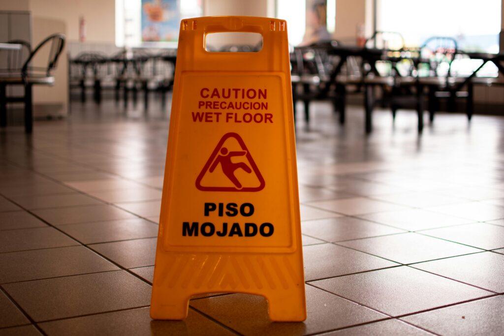 slip and fall sign to indicate a premises liability cases