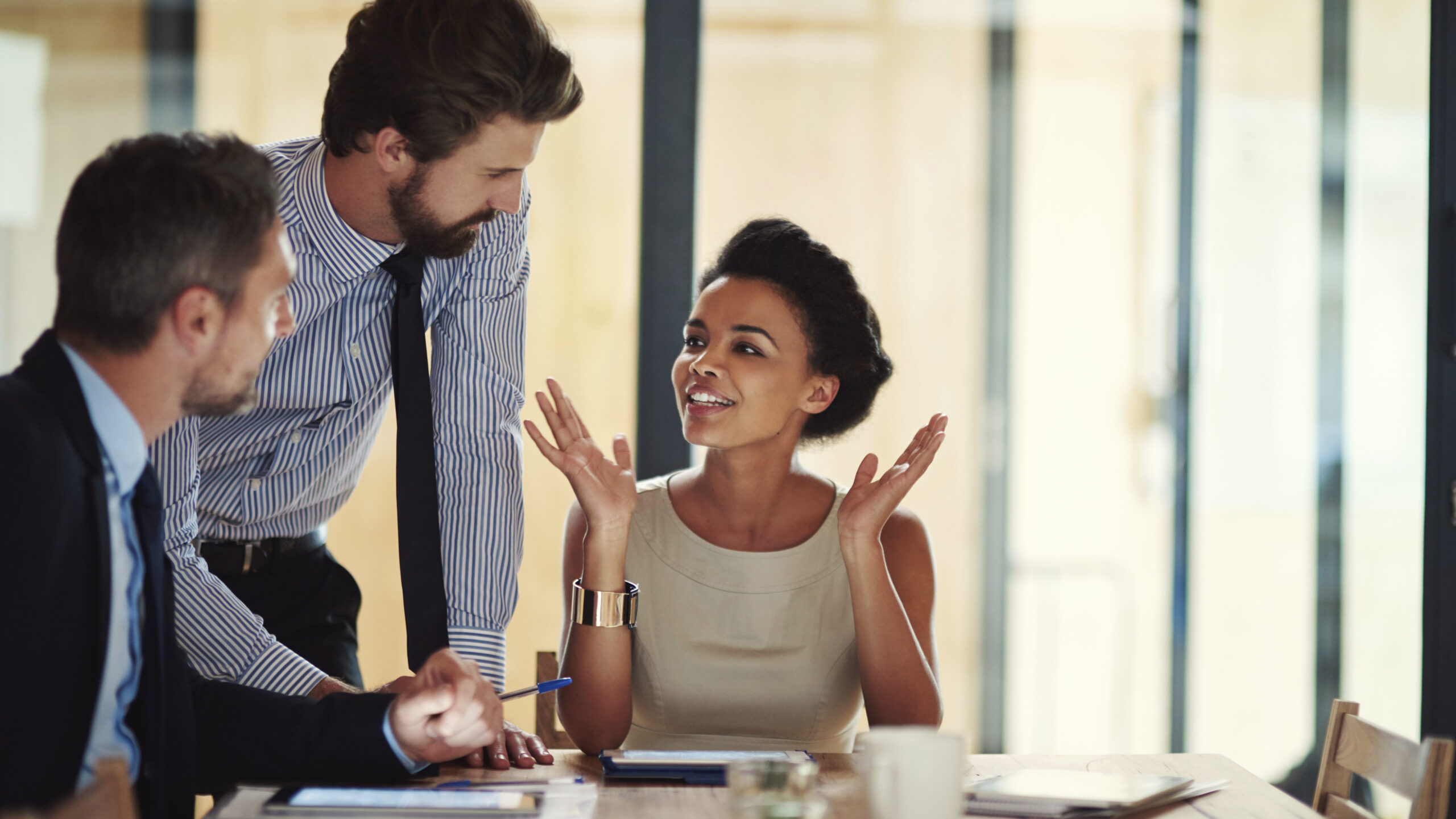 Three personal injury lawyers in Nashville discussing a case